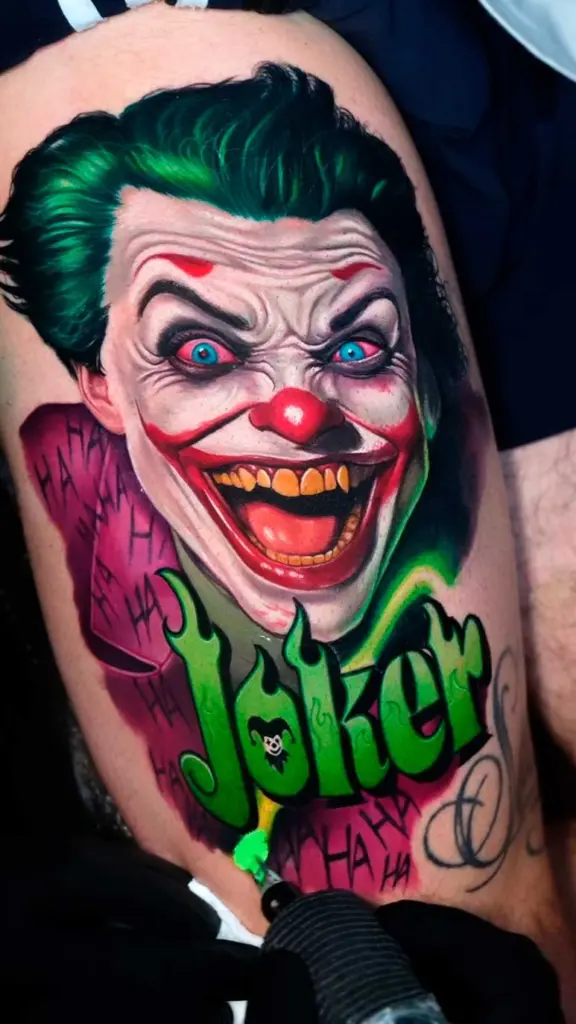 Joker – Lettering color realism tattoo by Pablo Frias