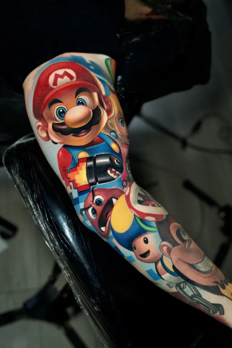 Super Mario Sleeve color realism tattoo on sleeve by Pablo Frias